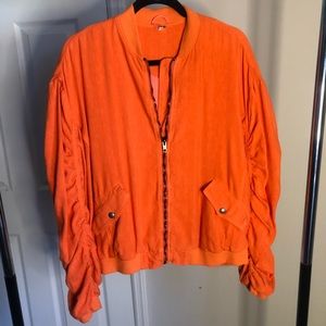 Orange bomber jacket